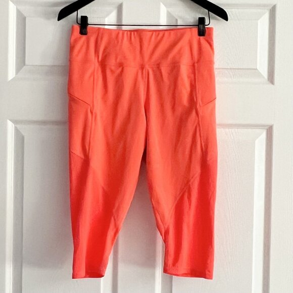 Athleta bright orange leggings mesh capri cropped zip pockets drawcord size M - Picture 1 of 7